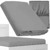 A folded grey fitted sheet is shown in the foreground, with a second folded grey fitted sheet in the background. A white bed frame is visible below the foreground sheet. Produktbild-Vorschau