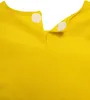 A close-up view of the neckline of a yellow children's costume, showing two white circular fasteners. Anteprima dell’immagine prodotto