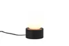 A modern black table lamp with a white spherical bulb on a white background. Náhľad obrázku produktu