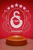 A 3D LED lamp with the Galatasaray logo and the word 'Şampiyon' (Champion) on a red background. Produktbild-Vorschau