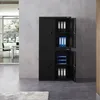 A black metal filing cabinet with two doors on each section is shown in an office setting. Náhľad obrázku produktu