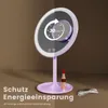 A purple LED makeup mirror with a timer overlay and text about energy saving. Podgląd zdjęcia produktu
