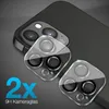 A close-up shot of two camera lens protectors for an iPhone 14 Pro, placed on a dark, reflective surface. Produktbild-Vorschau