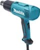 A teal and black Makita heat gun is shown against a white background. Podgląd zdjęcia produktu