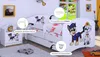 A child's bed with Paw Patrol characters, a bedside table, and a toy car on a rug. Produktbild-Vorschau