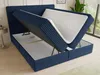 A blue upholstered boxspring bed with its storage compartment open, revealing the mattress and storage space. Produktbild-Vorschau