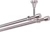 A close-up view of a double curtain rod system mounted from the ceiling. Anteprima dell’immagine prodotto