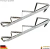 Two galvanized metal stair stringers with four steps each, presented against a white background. Podgląd zdjęcia produktu