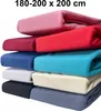 A stack of folded fleece sheets in various colors. Produktbild-Vorschau