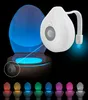 A toilet seat light with a motion sensor, shown in blue light, with other colored toilet lights displayed below. Voir les images du produit