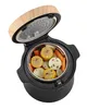 A close-up view of a black electric pot with an open lid, filled with cooked vegetables. Voir les images du produit