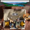A couple relaxing on a couch watching a projector screen in a living room. Produktbild-Vorschau