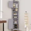 A gray corner cabinet with open shelves and two doors, displaying various decorative items and books. Náhled obrázku produktu