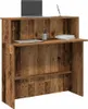 A reception desk with a laptop, books, and pens on it. Anteprima dell’immagine prodotto