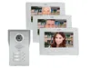 A video intercom system with a door station and three indoor monitors displaying different people. Produktbild-Vorschau