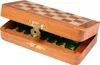 A small wooden chess set with the lid open, showing the pieces stored inside. Podgląd zdjęcia produktu