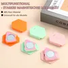 A flat lay collage of colorful hexagonal magnetic sewing guides. Produktbild-Vorschau