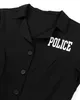 A close-up view of a black police costume shirt with the word "POLICE" printed in white on the chest. Anteprima dell’immagine prodotto