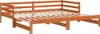 A wooden daybed frame with a slatted base, shown from a side angle against a white background. Podgląd zdjęcia produktu
