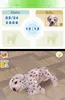A screen from a video game showing a digital pet dog, along with game information like date, time, and pet's name. Produktbild-Vorschau