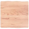A close-up view of a wooden tabletop with natural wood grain and a slightly wavy edge. Náhled obrázku produktu