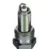 A close-up, studio shot of a spark plug against a white background. Produktbild-Vorschau