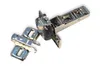 A pair of cabinet hinges on a white background. Produktbild-Vorschau