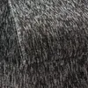 A close-up view of a textured carpet with a flecked black and white pattern. Produktbild-Vorschau