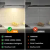 A split image comparing two under-cabinet lights, one labeled 'uns' (us) with positive features and the other 'andere' (others) with negative features. Produktbild-Vorschau