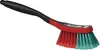 A cleaning brush with a black handle and a red and teal brush head, isolated on a white background. Produktbild-Vorschau