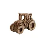 A wooden 3D puzzle tractor. Voir les images du produit