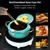 A deep fryer pot with food being fried and images of fried food. Podgląd zdjęcia produktu