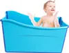 A child is taking a bath in a blue portable bathtub. Podgląd zdjęcia produktu