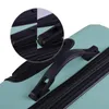 Close-up view of a teal suitcase, showing the handle and zipper details. Náhľad obrázku produktu