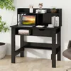 A black desk with a laptop, books, and a small plant on it, set against a white wall. Produktbild-Vorschau