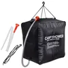 A black camp shower bag with accessories is displayed against a white background. Anteprima dell’immagine prodotto