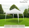 A white pop-up gazebo set up on a green lawn in a backyard, with trees and a hedge in the background. Produktbild-Vorschau