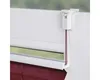 Close-up of a white window blind clip and cord attached to a white window frame. Produktbild-Vorschau