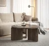 A living room scene with a couch, coffee table, and decorative items. Voir les images du produit