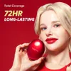 A woman holding a red compact makeup product. Voir les images du produit