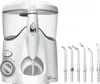A white Waterpik WF-100 Ultra water flosser is shown on a white background, with several interchangeable tips displayed to its right. Podgląd zdjęcia produktu