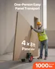 A construction worker is using a panel cart to transport a large sheet of material. Podgląd zdjęcia produktu