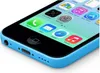 Close-up of the bottom corner of a blue iPhone 5C, showing the home button, speaker grille, and headphone jack. Produktbild-Vorschau