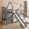 A children's bunk bed with a slide and storage stairs, set up in a bedroom with decorative lights. Podgląd zdjęcia produktu
