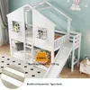 A white bunk bed with a slide, designed in a house shape with windows and a railing, set against a light blue wall. Produktbild-Vorschau