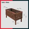 A wooden planter box with dimensions indicated by measurement lines and text. Anteprima dell’immagine prodotto