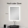 A bathroom sink with a mirror above it, showing product dimensions. Produktbild-Vorschau