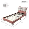 A diagram showing the dimensions of a pink bed with a bow-shaped headboard. Produktbild-Vorschau