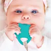 A close-up shot of a baby's face as they chew on a teal teething toy. Anteprima dell’immagine prodotto