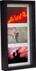 A multi-photo frame with three distinct images: a neon sign that says 'with love', a person painting a heart on a wall, and a silhouetted couple against a sunset. Náhled obrázku produktu